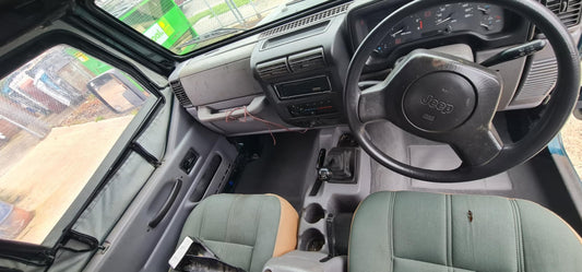 Moulded carpet fitted to a right-hand-drive Jeep Wrangler TJ
