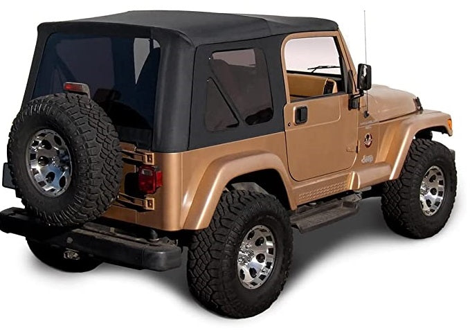 Jeep Wrangler TJ fitted with a black replacement soft top