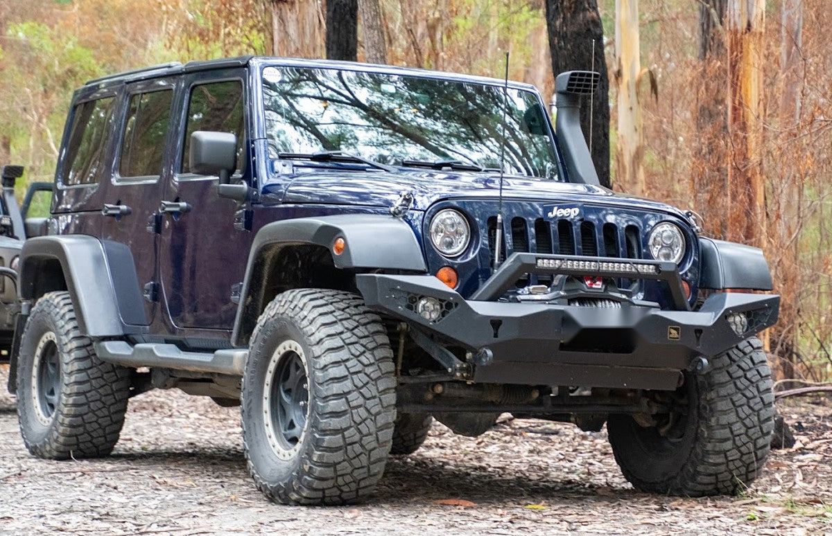 Blue lifted Jeep Wrangler JK Unlimited